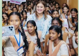 a leady teacher is taking selfie with their students 